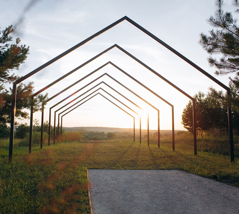 banner photo of sun and landscape